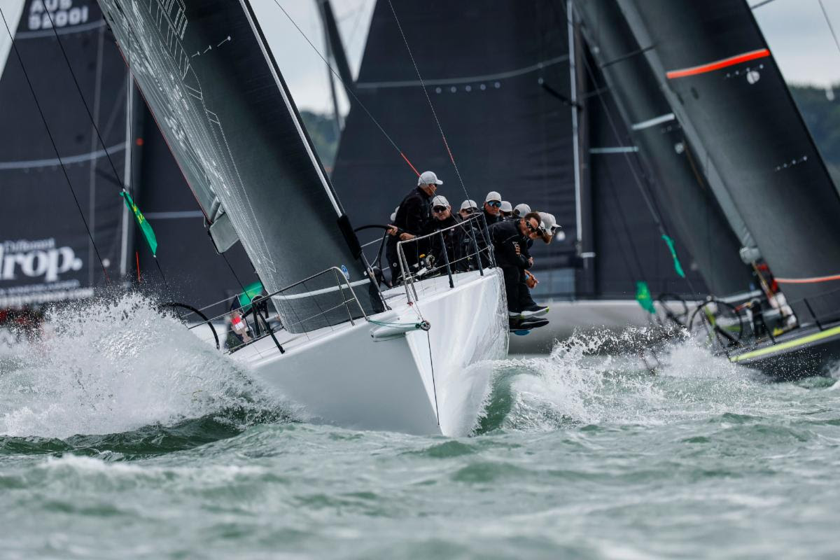 Hard gains and close calls as Admiral’s Cup fleet powers west