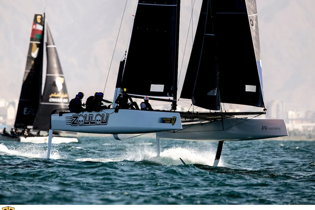Zoulou warriors beat the drum in GC32 Oman Cup, Alinghi holed on her port side
