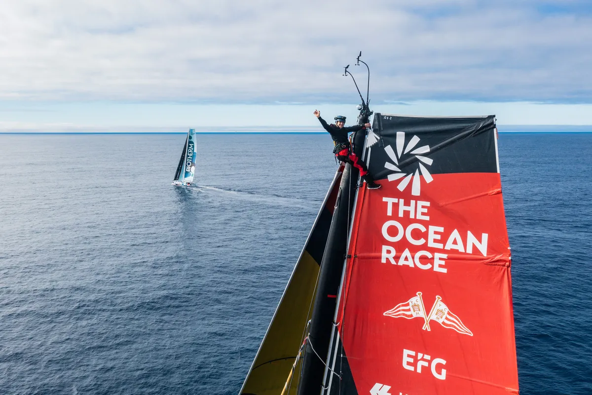 Ocean Race IMOCAs  lined up alongside each other in slow drag race east